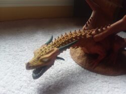 FDM printed dragon, hand painted by my lovely wife — now living on the shelf behind me during my Greyhawk livestreams.