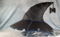 Witch's Hat Traditional witch's hat in black textured leather with electric blue stitching and sky blue accents.