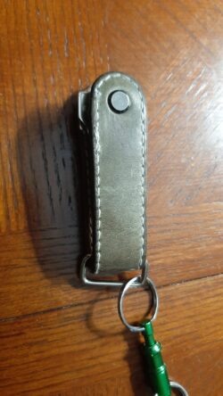 A compact key carrier made from hand-dyed vegetable tanned leather with nickel hardware for clean, durable everyday carry.