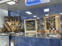 A commissioned laser-engraved birch sign made using my friend’s artwork — sealed in TotalBoat resin for a long life.